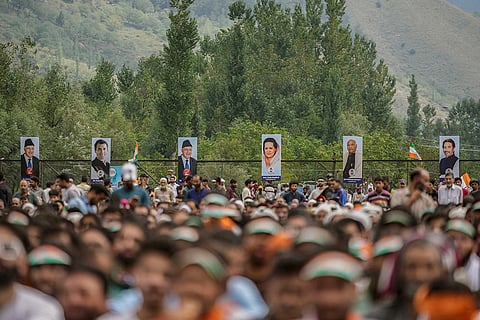  J-K Assembly polls: Supporters listen as Congress party leader Rahul Gandhi, speaks